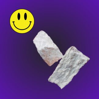 A smiling yellow emoji is positioned above two irregularly shaped white cocaine rocks on a purple background.