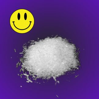 A small pile of crystalline ketamine powder on a reflective surface.
